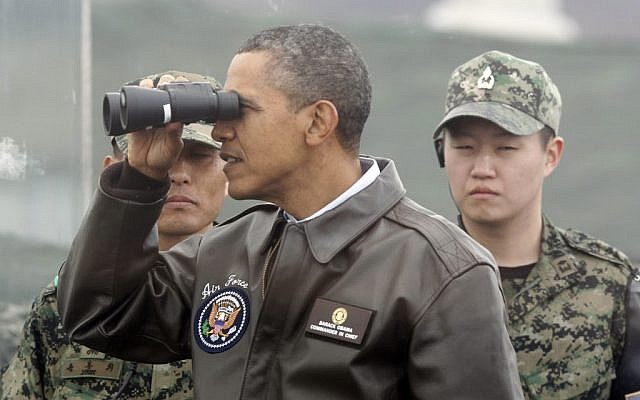 US President Barack Obama tours the military border between the two Koreas, in Panmunjom, South Korea, in March 2012 (AP/Pablo Martinez Monsivais)