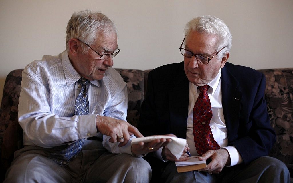Dachau survivor Ernie Gross (L) and Dachau liberator Don Greenbaum recount their experiences. (photo credit: AP/Matt Rourke)