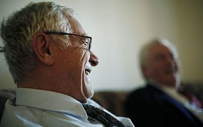 Dachau survivor Ernie Gross (L) accompanied by Dachau liberator Don Greenbaum. (photo credit: AP/Matt Rourke)