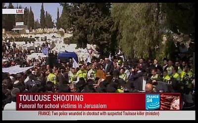 Image capture of Jerusalem funeral of victims killed in Toulouse Jewish school killing (photo credit: France 24)