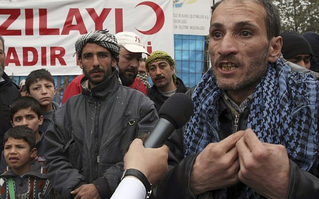 A newly arrived Syrian refugee in Turkey (photo credit: AP/Burhan Ozbilici)