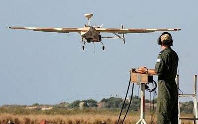 A 'Searcher II' (Kochav Lavan) UAV returns from a reconnaissance mission. (photo credit: Tsahi Ben-Ami/Flash90)