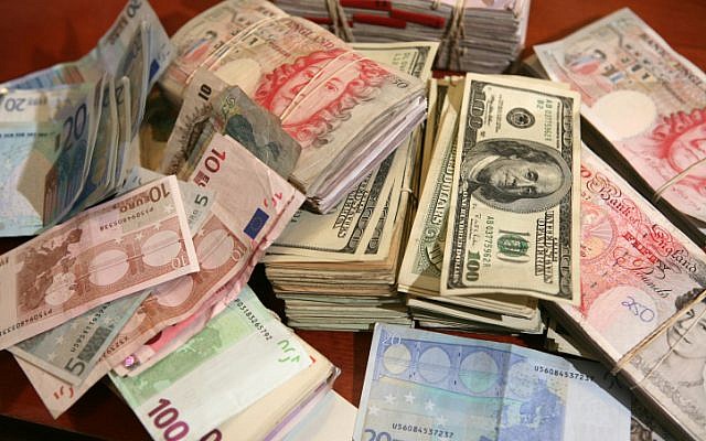 Illustrative photo of foreign currencies. (Yossi Zamir/Flash90)