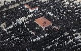 Thousands of ultra-Orthodox men attend the funeral of Rabbi Moshe Yehoshua Hager in Bnei Brak (photo credit: Yaakov Nahomie/Flash90)