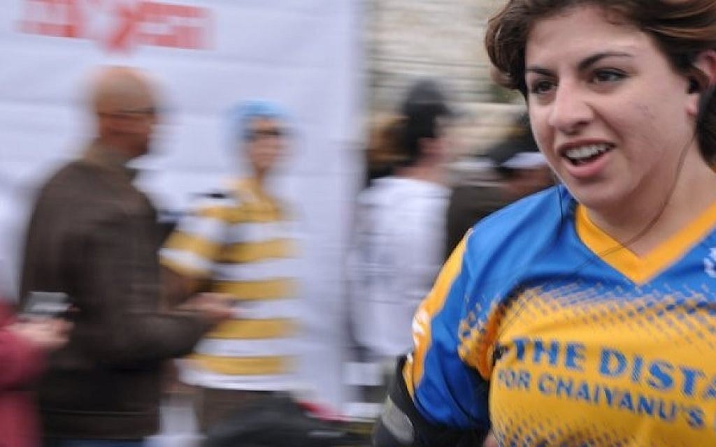 Pia Levine running in the 2011 Jerusalem half-marathon. (Photo credit: Courtesy)