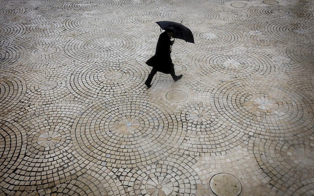 Rainy day gear (photo credit: Miriam Alster/Flash90)