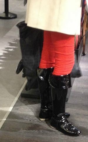 A patent leather-like boot (photo credit: Jessica Steinberg/Times of Israel)
