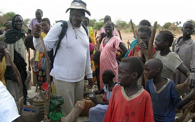 Simon Deng during a 'slave liberation mission' to Sudan in 2003, before South Sudan became independent (photo credit: Courtesy the American Anti-Slavery Group)