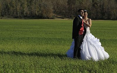 Illustrative photo of a couple posing before their wedding, March 2012. (Tsafrir Abayov/Flash90)