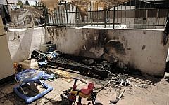 A Tel Aviv kindergarten used by children of migrants and foreign workers suffered damage from a Molotov cocktail Friday (photo credit: Tomer Neuberg/Flash90)