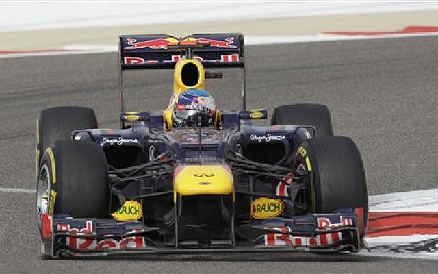 Red Bull driver Sebastian Vettel of Germany at the Formula One Bahrain International Circuit in Sakhir, Bahrain, Sunday, April 22, 2012. (photo credit: AP/Hassan Hammar) Red Bull driver Sebastian Vettel of Germany at the Formula One Bahrain International Circuit in Sakhir, Bahrain, Sunday, April 22, 2012. (photo credit: AP/Hassan Hammar)
