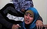 Relatives mourn Ali Shaaban, the Lebanese journalist killed by Syrian fire (photo credit: AP Photo/Bilal Hussein)