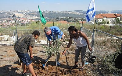 Public Advocate Bill de Blasio (center) planting a tree with wife Chirlane McCray (right) and son Dante (left) in the town of Yad Assa, just outside of Jerusalem. (photo credit: Flickr/Public Advocate Bill de Blasio) Public Advocate Bill de Blasio (center) planting a tree with wife Chirlane McCray (right) and son Dante (left) in the town of Yad Assa, just outside of Jerusalem. (photo credit: Flickr/Public Advocate Bill de Blasio)