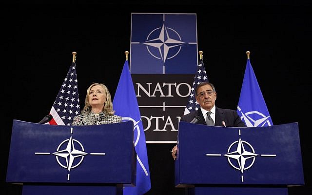 US Secretary of State Hillary Rodham Clinton and Defense Secretary Leon Panetta hold a news conference at NATO Headquarters in Brussels, Belgium, Wednesday (photo credit: AP/Jacquelyn Martin)  Summary