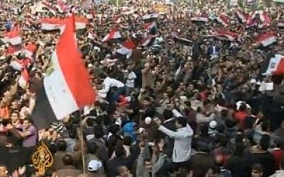 Egyptian Muslim Brotherhood supporters protesting in Cairo (photo credit: YouTube screen caption/Al-Jazeera) Egyptian Muslim Brotherhood supporters protesting in Cairo (photo credit: YouTube screen caption/Al-Jazeera)