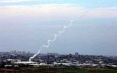 Illustrative photo of two Kassam rockets heading toward Israel shortly after they are fired by Palestinians in Gaza. (photo credit: Edi Israel/Flash90/File)