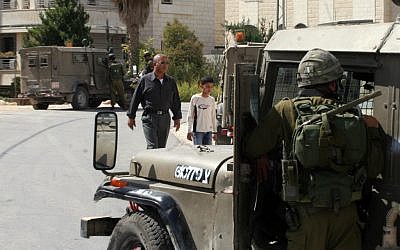 IDF soldiers patrol the streets of Ramallah in 2008 (photo credit: Issam Rimawi / Flash 90)