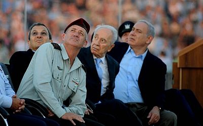 Different directions. Barak, Gantz, Peres and Netanyahu (from left) during a graduation ceremony of Israeli pilots at the Hatzerim air force base near Beersheba last June. (photo credit: Moshe Milner/Flash90)