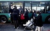 Illustrative photo of ultra-Orthodox women entering a bus through the back door in Mea Shearim, Jerusalem, in 2011 (Uri Lenz/Flash90/File)