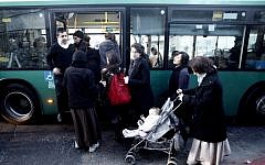 Illustrative photo of ultra-Orthodox women entering a bus through the back door in Mea Shearim, Jerusalem, in 2011 (Uri Lenz/Flash90/File)