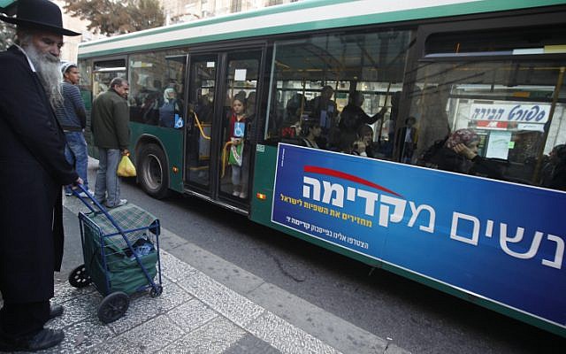 Advertisements posted on buses by the Kadima party draw attention to the exclusion of women in public advertisements. (photo credit: Miriam Alster/Flash90) Advertisements posted on buses by the Kadima party draw attention to the exclusion of women in public advertisements. (photo credit: Miriam Alster/Flash90)