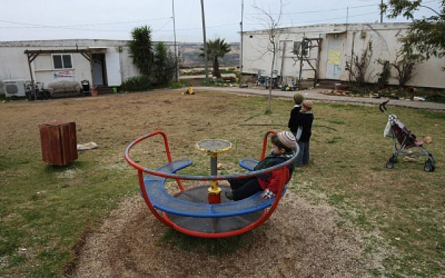 Children play in West Bank outpost Migron. (photo credit: Kobi Gideon/Flash90)
