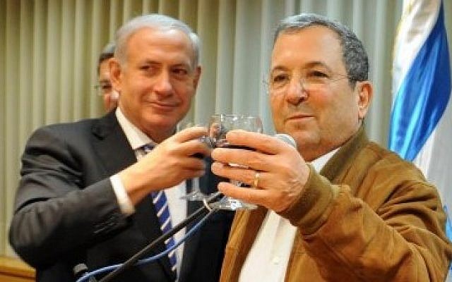 Benjamin Netanyahu toasts Ehud Barak on his 70th birthday in February 2012. (photo credit: Ministry of Defense/Flash90)
