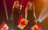 'The Voice' Israel winner Kathleen Reiter (right)  and her on-show mentor Sarit Hadad performing in the final episode (photo credit: Yonatan Sindel/Flash90)