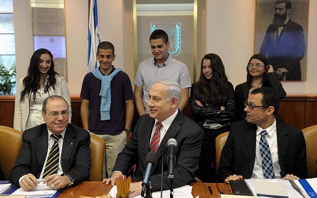 Benjamin Netanyahu (center) in the Knesset on Sunday morning (photo credit: Avi ohayon/Flash90) Benjamin Netanyahu (center) in the Knesset on Sunday morning (photo credit: Avi ohayon/Flash90)