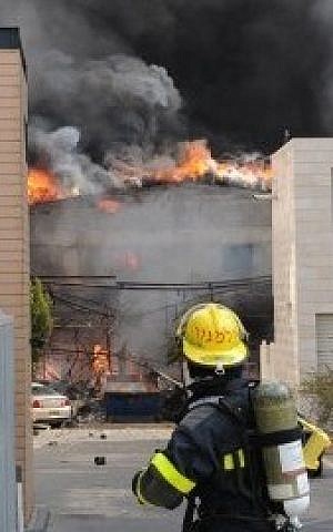 Israeli rescue workers at the scene of Raanana explosion. (photo credit: Gili Yaari/Flash90)