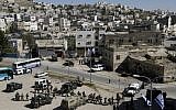 Security forces surround Beit Hamachpela in Hebron. (photo credit: Miriam Alster/Flash90)