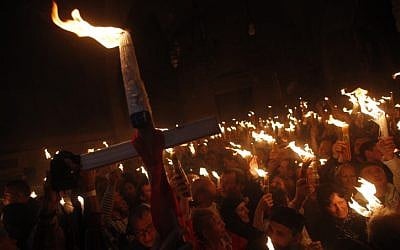 Orthodox Christian worshippers take part in the Holy Fire ceremony at the Church of the Holy Sepulcher in Jerusalem's Old City. (photo credit: Uri Lenz/Flash90) Orthodox Christian worshippers take part in the Holy Fire ceremony at the Church of the Holy Sepulcher in Jerusalem's Old City. (photo credit: Uri Lenz/Flash90)