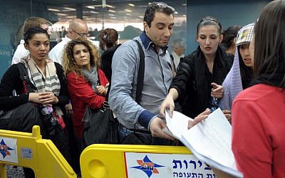 Passengers disembarking from international flights at Ben Gurion Airport Sunday (photo credit: Avi Ohayon/GPO/Flash90)