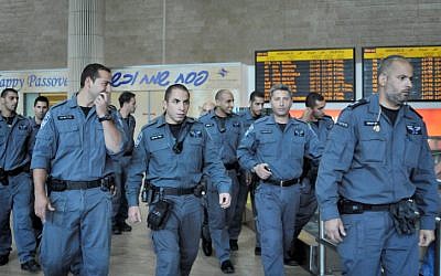 Israeli police wait for foreign activists inside the arrival hall of the Ben Gurion Airport (photo credit: Yossi Zeliger/Flash90)