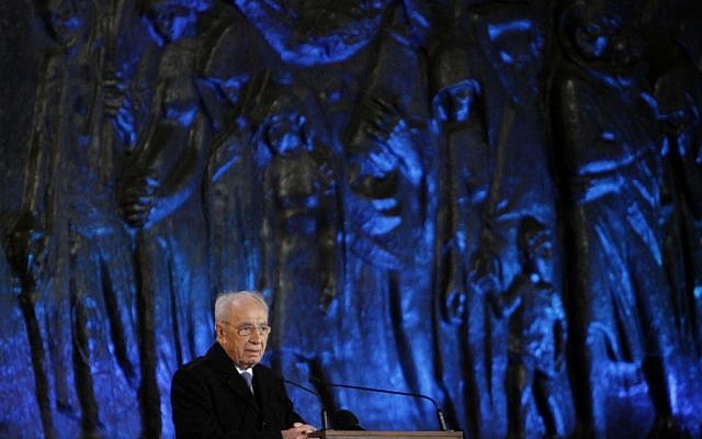 President Shimon Peres speaks at the official Holocaust Remembrance Day ceremony at Yad Vashem in Jerusalem on Wednesday night. (photo credit: Miriam Alster/Flash90) President Shimon Peres speaks at the official Holocaust Remembrance Day ceremony at Yad Vashem in Jerusalem on Wednesday night. (photo credit: Miriam Alster/Flash90)