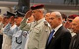 IDF Chief of the General Staff Maj. Gen. Benny Gantz, center, participates in a Memorial Day Ceremony, April 25, 2012. (photo credit: Marc Israel Sellem/Flash90)