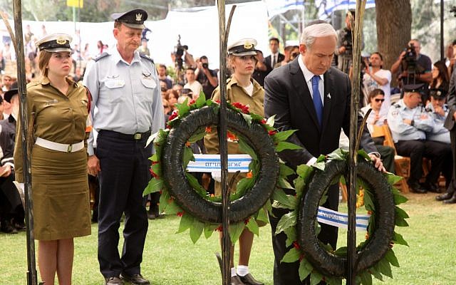 Benjamin Netanyahu laying a memorial wreath Wednesday. (photo credit: Marc Israel Sellem/pool/Flash90) Benjamin Netanyahu laying a memorial wreath Wednesday. (photo credit: Marc Israel Sellem/pool/Flash90)