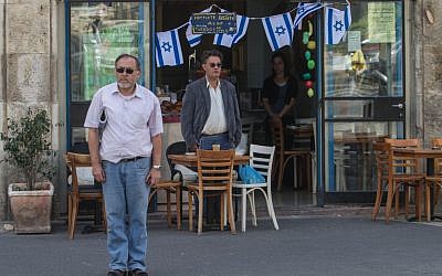 Israelis observing a moment of silence in Jerusalem on Wednesday. (photo credit: Uri Lenz / Flash90) Israelis observing a moment of silence in Jerusalem on Wednesday. (photo credit: Uri Lenz / Flash90)