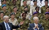 Prime Minister Benjamin Netanyahu and President Shimon Peres at the ceremony for outstanding soldiers at the President's Residence in Jerusalem last week (photo credit: Miriam Alster/Flash90)