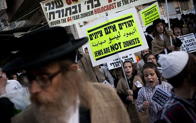 Members of the anti-Zionist group Neturei Karta protest against the State of Israel, which they believe should not exist before the coming of the messiah, on Independence Day. (photo credit: Yonatan Sindel/Flash90) Members of the anti-Zionist group Neturei Karta protest against the State of Israel, which they believe should not exist before the coming of the messiah, on Independence Day. (photo credit: Yonatan Sindel/Flash90)
