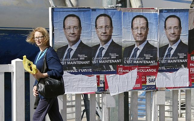 Posters of Francois Hollande, the French Socialist Party candidate for the 2012 presidential elections (photo credit: AP/Claude Paris)