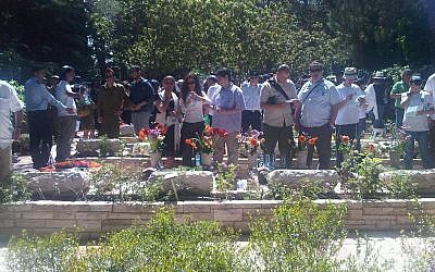 Mourners at Mount Herzl Wednesday. (photo credit: Aaron Kalman / Times of Israel staff) Mourners at Mount Herzl Wednesday. (photo credit: Aaron Kalman / Times of Israel staff)