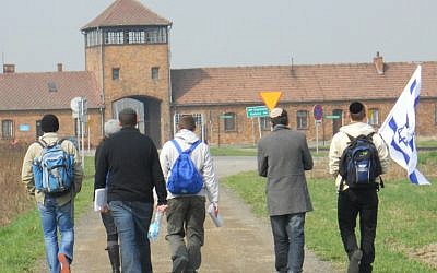 Young Jews entering the gates of Auschwitz-Birkenau Extermination Camp in Poland during the 2010 March of Living. (photo credit: March of Living International/JTA)