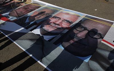 Posters of Egyptian presidential candidates in a Tahrir Square rally last month (photo credit: AP/Nasser Nasser)