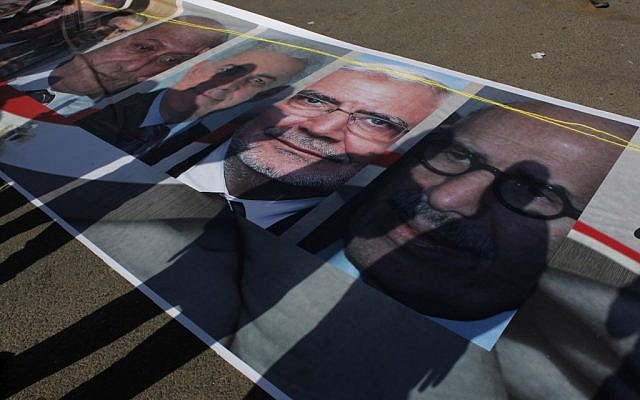 Posters of Egyptian presidential candidates in a Tahrir Square rally last month (photo credit: AP/Nasser Nasser) Posters of Egyptian presidential candidates in a Tahrir Square rally last month (photo credit: AP/Nasser Nasser)