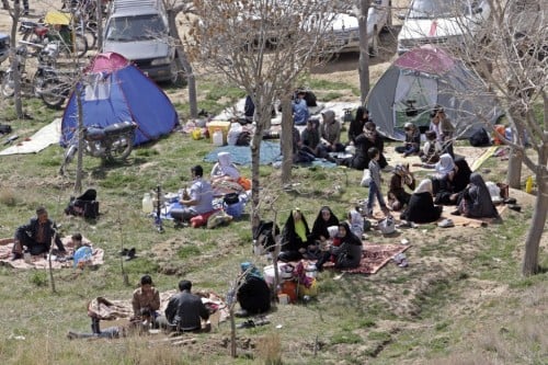 Iranian families picnicking in celebration of the ancient festival of Sizdeh Bedar. (photo credit: AP/Vahid Salemi)