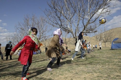 Iranian women play ball during a picnic marking ancient festival of Sizdeh Bedar near Esfarayen, Iran. (photo credit: AP/Vahid Salemi)