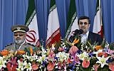 Mahmoud Ahmadinejad speaks at an Army Day parade Tuesday (photo credit: AP/Vahid Salemi)