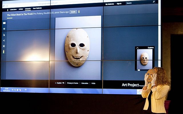 Curator Debby Hershman holds a 9,000 year old Neolithic stone mask during the launch of Google Art project at the Israel Museum in Jerusalem, on Tuesday (photo credit: AP/Oded Balilty) Curator Debby Hershman holds a 9,000 year old Neolithic stone mask during the launch of Google Art project at the Israel Museum in Jerusalem, on Tuesday (photo credit: AP/Oded Balilty)