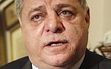 Awn al-Khasawneh speaks to reporters after his appointment as Jordan's new prime minister in Amman. (photo credit: AP)